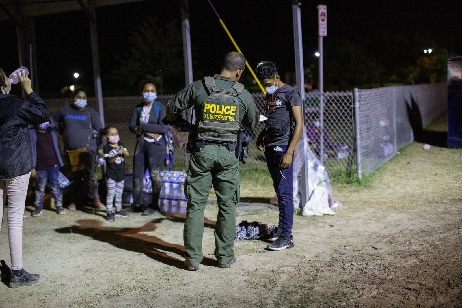 Some migrants traveling in a group consisting of only men attempted to avoid law enforcement officials after illegally entering the U.S. by running into bushes told Border Patrol agents they were 17 years old after they were apprehended near La Joya, Texas on August 7, 2021. (Kaylee Greenlee – Daily Caller News Foundation)