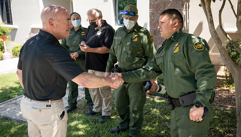 U.S. Dept. of Homeland Security Secretary Alejandro Mayorkas visits with a group of Border Patrol agents and CBP employees as he tours the Del Rio Port of Entry in Del Rio, Texas, September 20, 2021. DHS photo by Benjamin Applebaum